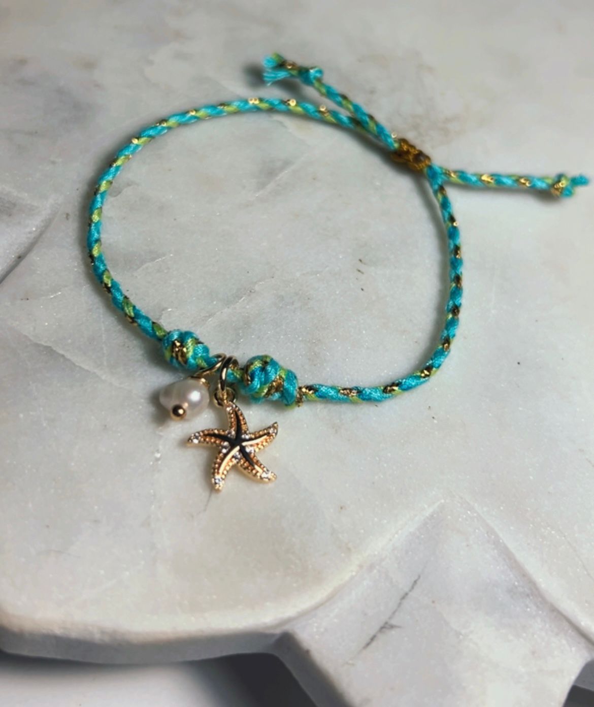 Pulsera perla y estrella